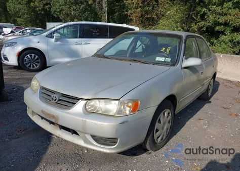 2002 Toyota Corolla Le z USA, uszkodzony, nr VIN 1NXBR12E12Z612437